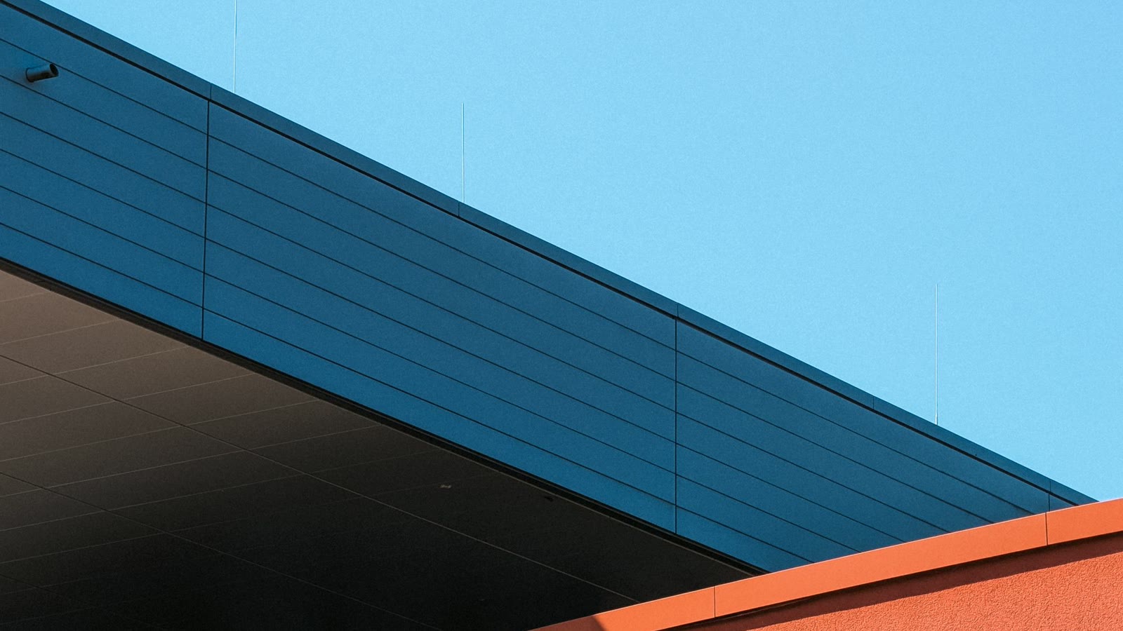 Bold orange and blue architecture used for environment direction